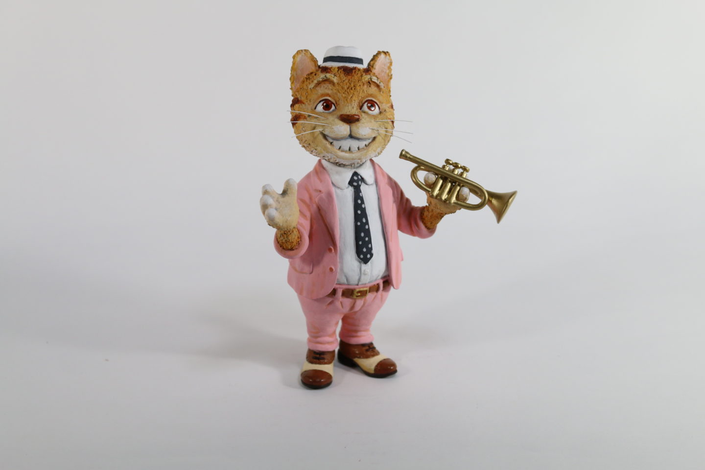 A cat blowing a trumpet einostudio